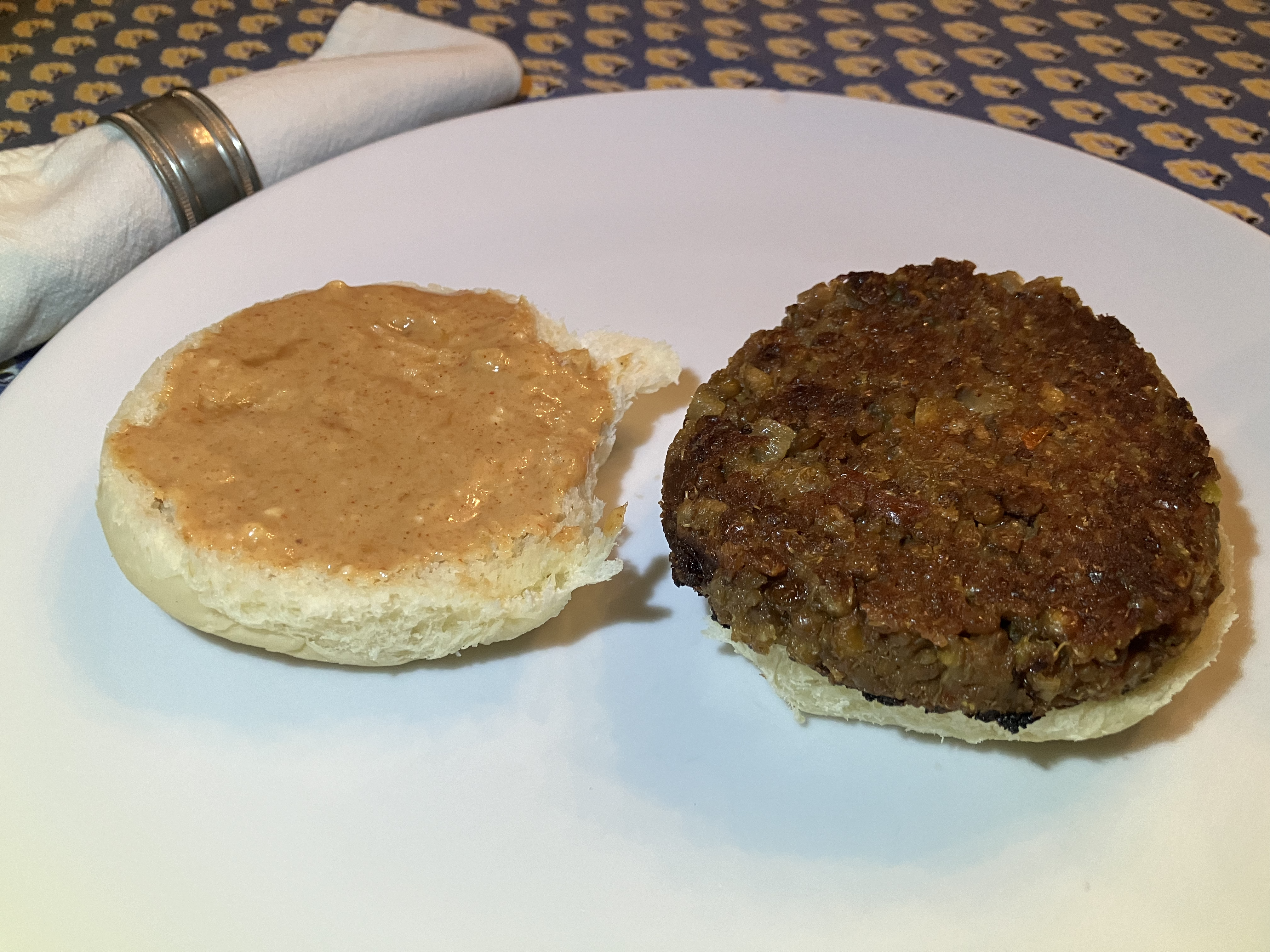 Burger with weird fork in background but it's the only photo I had without intense glare